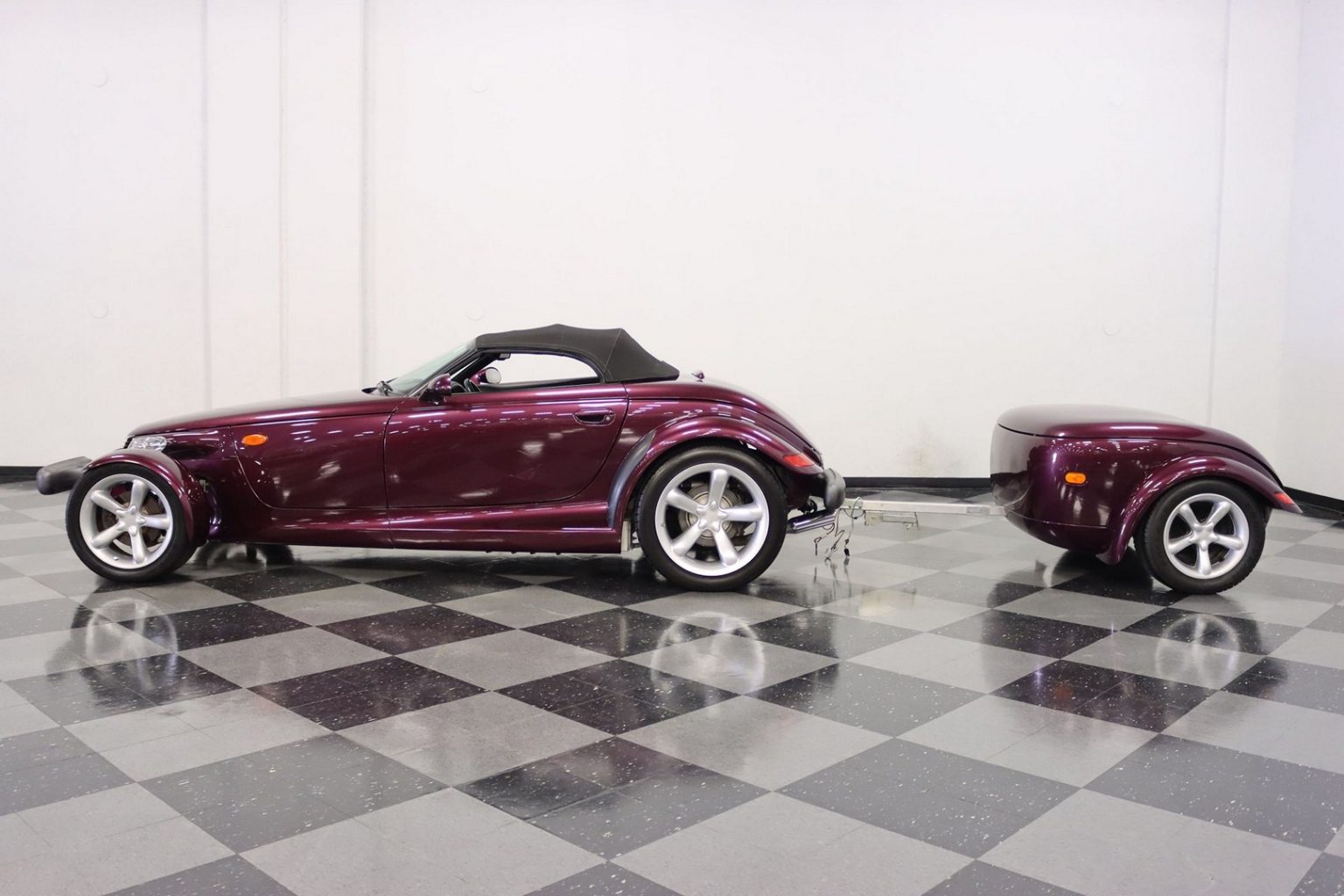How Much Does a Purple 1999 Plymouth Prowler With a Matching Trailer Cost?